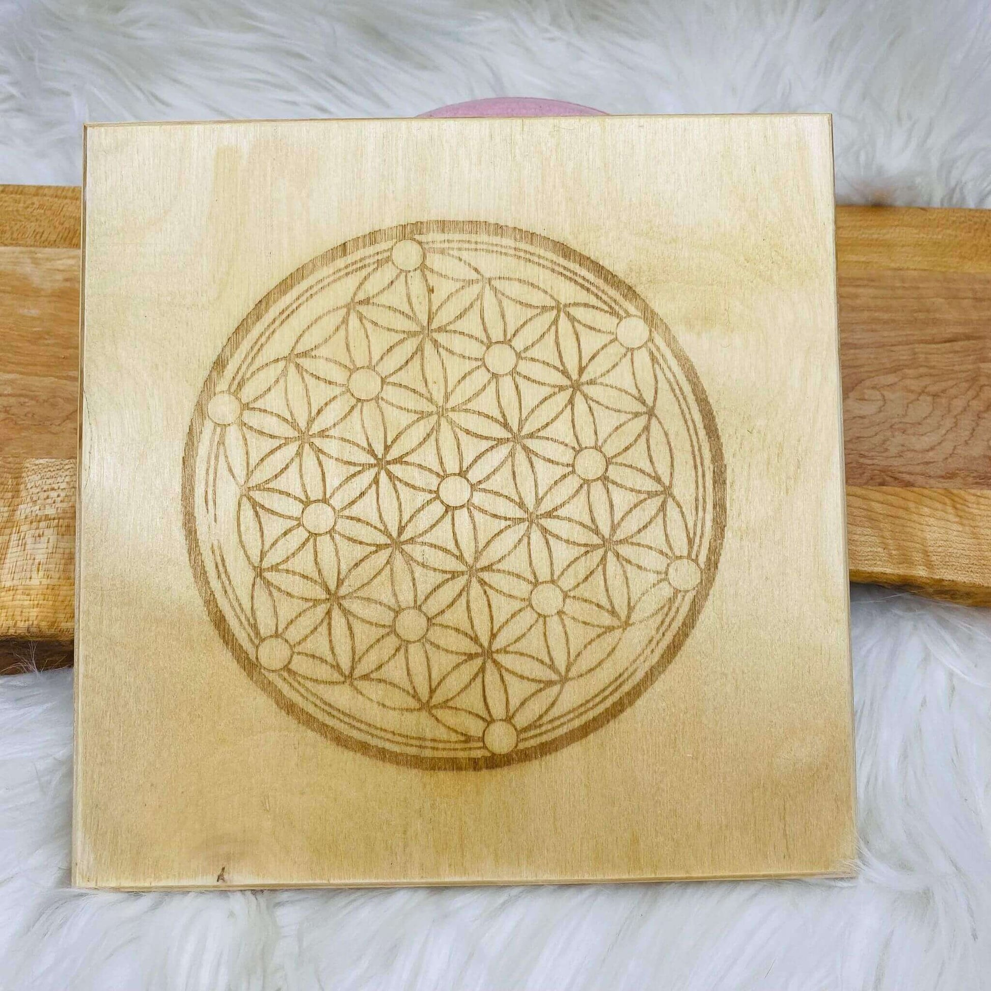 Two-sided wood grid (flower of life/ Sri Yantra) at $35 only from Spiral Rain